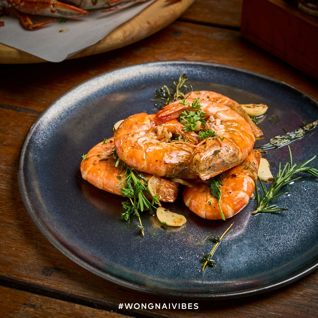 King prawn rosemary with fresh herbs, signature grilled seafood dish at Laciana By The Sea Hua Hin